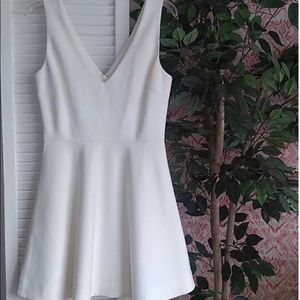 Elizabeth and James. Flattering fit and flare off white cocktail dress. Size 6.